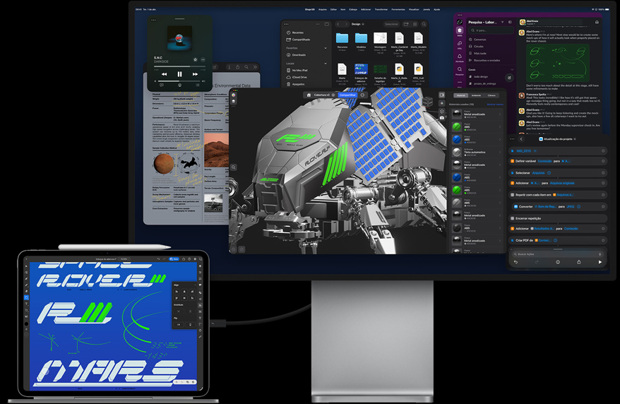 Parte da frente do iPad Pro conectado a um Magic Keyboard, ambos conectados a um monitor externo Studio Display. A tela do iPad Pro mostra um app de design gráfico com cores e textos vibrantes, e o Studio Display exibe vários apps e um modelo 3D