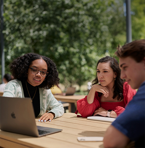 A small group of Apple interns working together at Caffè Macs.