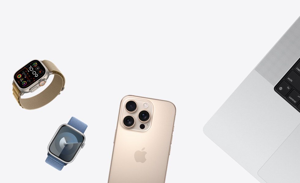 Divers produits dispersés, dont une Apple Watch en titane naturel avec Bracelet Boucle Alpine Sahara, une Apple Watch argent avec Bracelet Boucle Sport pervenche, un iPhone en titane sable et un MacBook argent