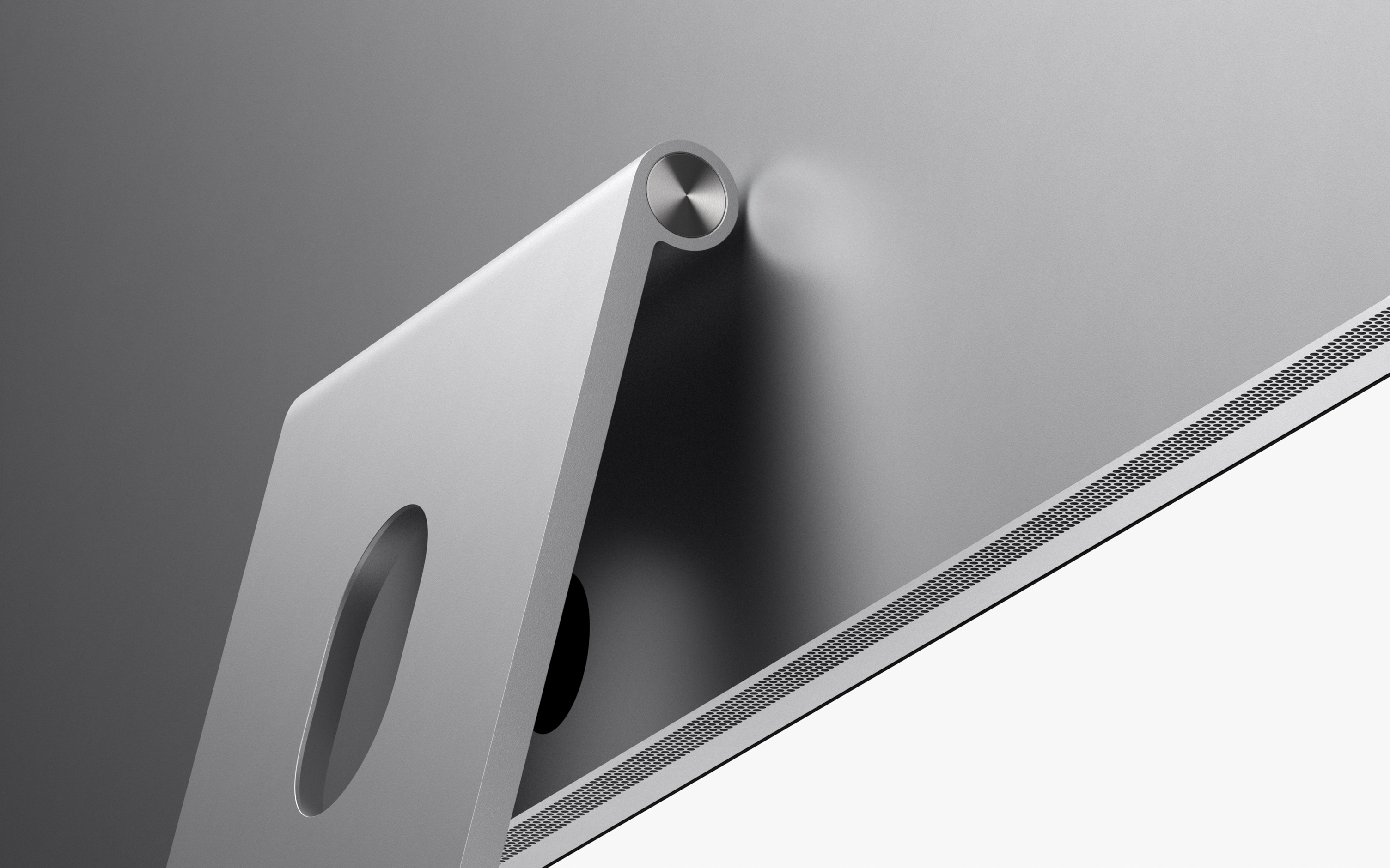 Studio Display fixé sur le support à inclinaison et hauteur réglables, vu de dos